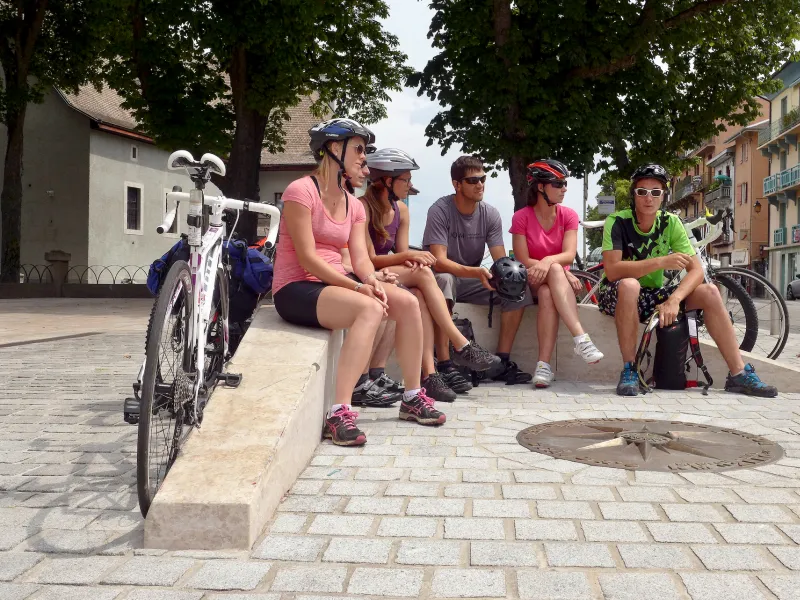 Group departing from Route des Grandes Alpes by bike