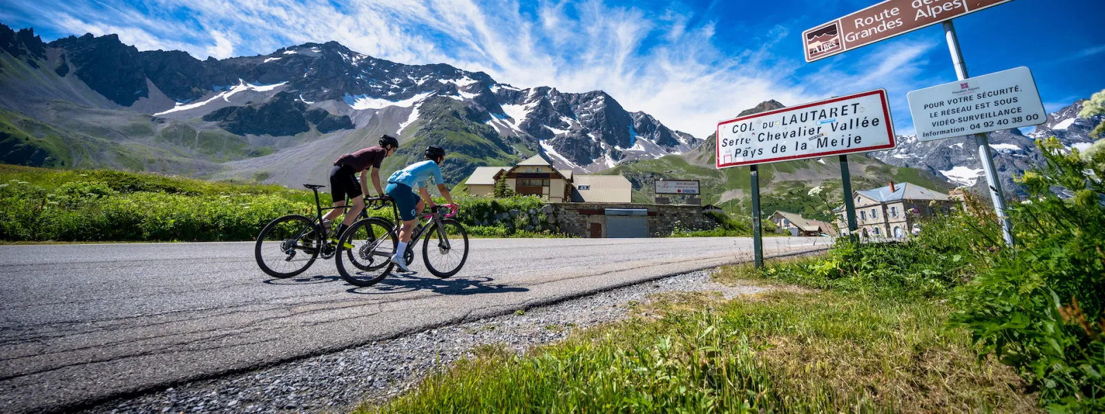 Cyclists on the Col du Lautaret on the Route des Grandes Alpes®.