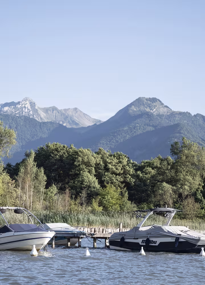 Boats on Lake Annecy at the source of the lake