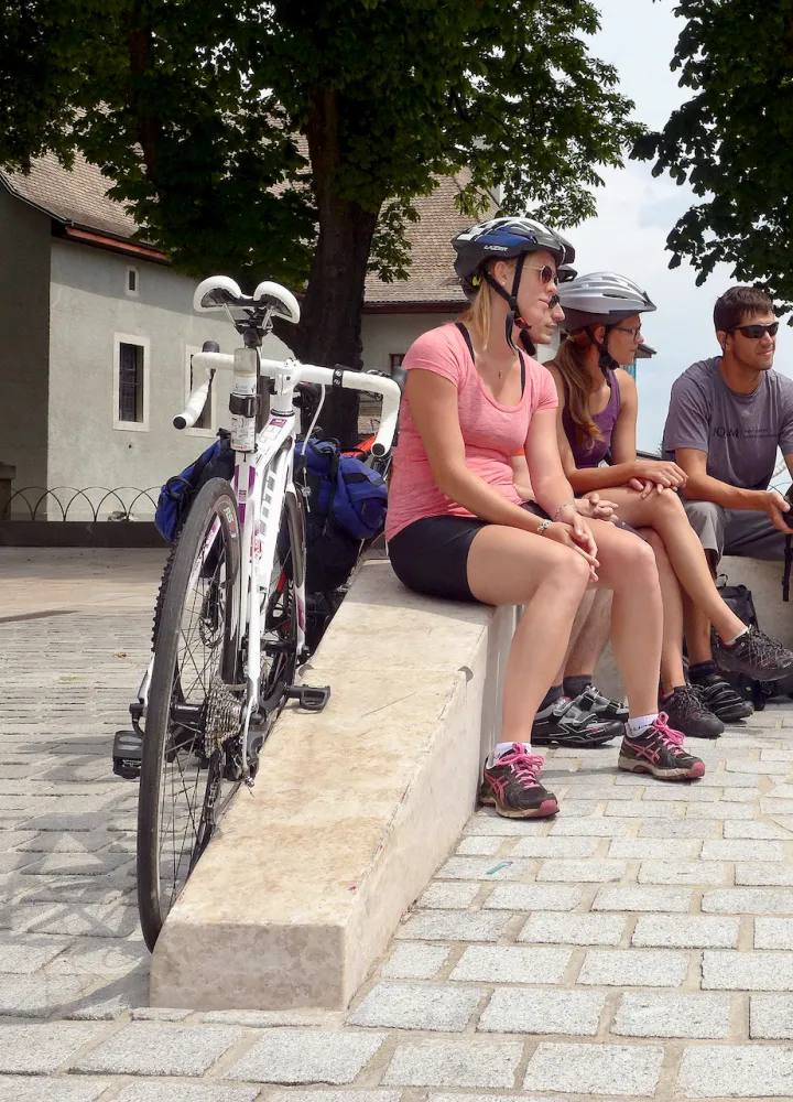 Group departing from Route des Grandes Alpes by bike