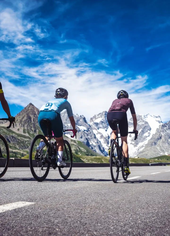three cyclists on the Route des Grandes Alpes