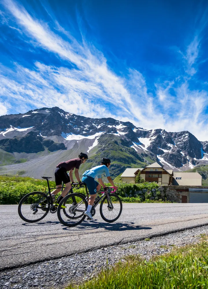 Cyclists on the Col du Lautaret on the Route des Grandes Alpes®.