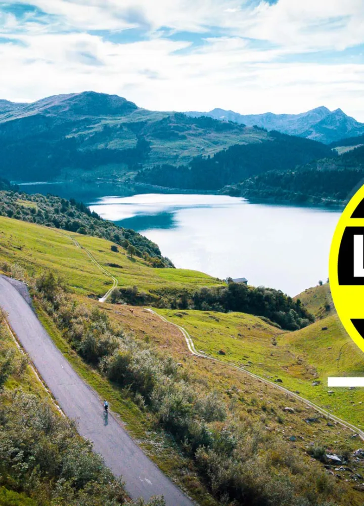 lac de roselend photo by bike with etape du tour logo