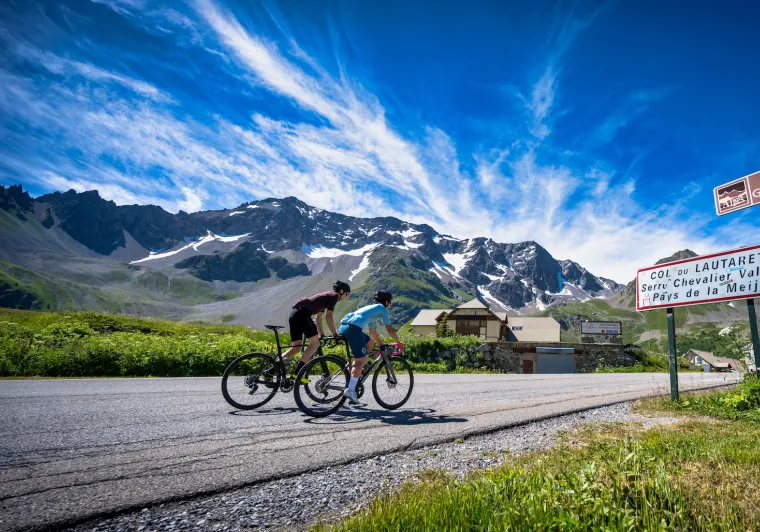 Cyclists on the Col du Lautaret on the Route des Grandes Alpes®.